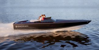 a donzi 22 classic ripping along the muskoka water in Gordon Bay