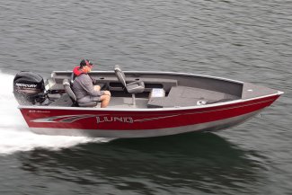 a seasoned fisher heads along Gordon Bay in his Lund 1675 Adventure tiller aluminum boat.
